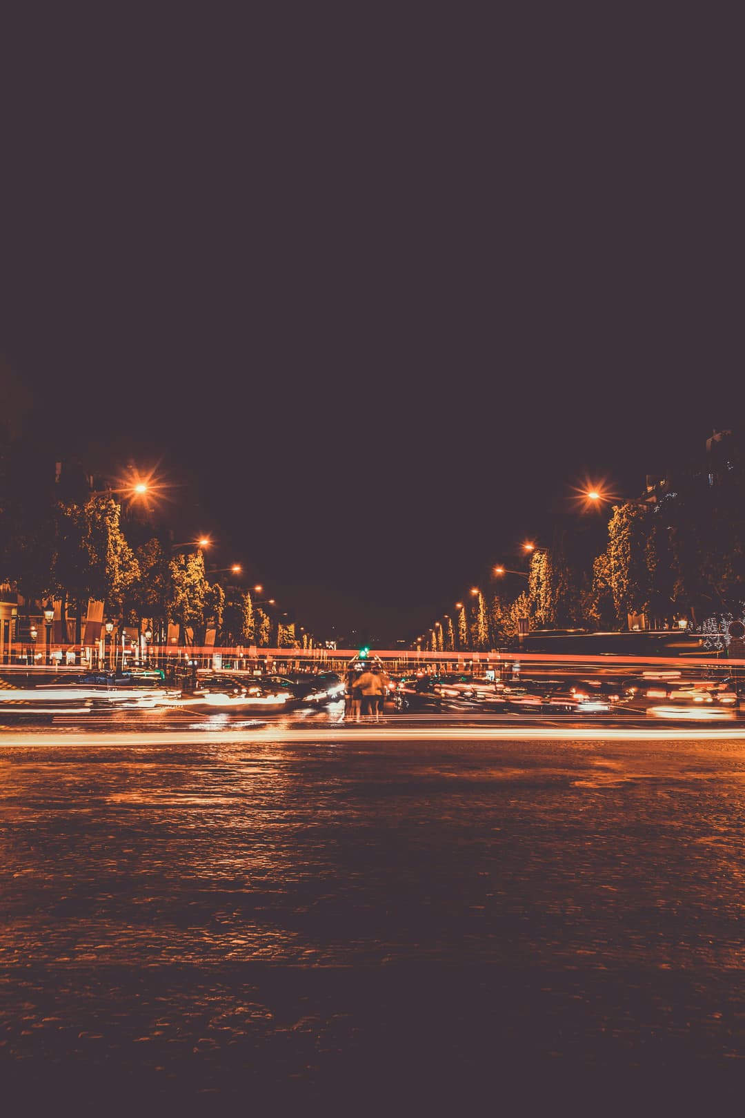 A beautiful view of a city with street lights at night